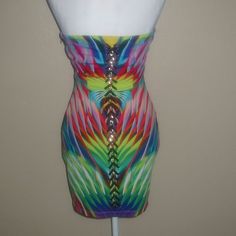 Get Ready To Turn Heads With This Stunning Bebe Mini Dress! The Strapless Design Is Perfect For Showing Off Your Shoulders, While The Sweetheart Neckline Adds A Touch Of Femininity. The Tropical Multicolor Print Is Perfect For Summer, And The Chain And Lacing Detail Down The Back Adds A Bit Of Edginess To The Look. Made Of A Polyester Blend, This Dress Is Comfortable And Perfect For Any Occasion. Whether You're Going On Vacation Or Attending A Party, This Dress Is A Must-Have. It's Available In Christmas Cocktail Dresses, Black Cutout Dress, White Lace Mini Dress, Quilt Dress, Floral Skater Dress, Green Mini Dress, Bebe Dresses, Sequin Mini, Mini Wrap Dress