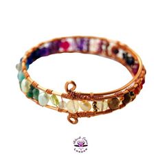 Elegant one of a kind colourful genuine gemstone wirework rainbow bangle - handcrafted with heart from the Beaux Artisan Gems by Black Lotus London Collection. ❤︎ Rainbow-hued multi gem and pearl bangle ❤︎ Secure Bangle - Made-to-order in a range of sizes ❤︎ Wearable 0.5-inch width with assorted gemstones for a bright and colourful lookChoose from copper (pictured), gold or silver plated wire work - with optional upgrade to 925 Sterling Silver on request for an additional premium. Adorn yourself Hand Wrapped Multicolor Crystal Bracelet, Multicolor Hand Wrapped Crystal Bracelet, Adjustable Multicolor Spiritual Cuff Bracelet, Bohemian Adjustable Wire Wrapped Bangle, Multicolor Hand Wrapped Round Bead Jewelry, Multicolor Hand-wrapped Round Bead Jewelry, Spiritual Multicolor Hand Wrapped Bracelets, Adjustable Multicolor Spiritual Bangle, Unique Multicolor Crystal Bracelet As Gift