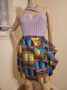 Make a statement with this vibrant African print skirt from high-quality Ankara fabric. Designed for both style and comfort, it's the perfect piece for casual days, special events, or adding some flair to your everyday look. The bold colors and patterns celebrate African culture, while the elastic waistband ensures a comfortable fit. N.B., The top in the display image is not included. African Print Skirt, Handmade African, Ankara Fabric, African Culture, Print Skirt, Printed Skirts, African Print, Everyday Look, Ankara