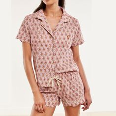 For the boho beauty and lover of lounging, this 100% cotton sleep set, in choice of colorful block prints, has a relaxed fit and thoughtful details like scalloped edging, an elastic waist and contrasting piping. Already supremely soft, the high-quality cotton will get softer and more comfy with every wash. Add a personal touch with an embroidered monogram.    S, M, L; See Product Information for Size Chart  100% cotton.  Fabric is not pre-washed and some shrinkage should be expected with 100% co Cotton Sleepwear With Floral Print And Short Sleeves, Relaxed Fit Feminine Cotton Sleepwear, Feminine Floral Cotton Sleepwear, Feminine Cotton Sleepover Sets, Cotton Floral Print Pajama Shorts For Daywear, Relaxed Fit Floral Print Pajama Shorts, Feminine Cotton Pajama Shorts For Pajama Party, Cotton Sleepwear For Relaxation, Feminine Cotton Tops For Lounging