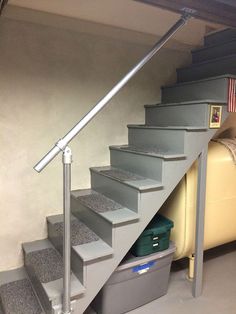 there is a set of stairs leading up to the second floor