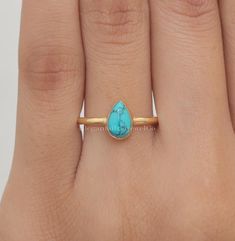 Arizona Turquoise Ring / 18k Gold Plated Solid Silver Ring / December Birthstone Ring / Handmade Silver Jewelry / Birthday Gift For Her Gemstone Name - Arizona Turquoise Base Metal - 925 Sterling Silver. Stone Quality - AAA Wight - 1.66 gm  Length - 0.9 cm   Width - 0.7 cm  Stone Shape - As shown in the picture Ring Size - All Ring Size Available You'll get the exact product as shown in the pictures We serve complete 925 sterling silver Jewelry and genuine properties of the stone. The products are dispatched from the small business from USA. Product Quality and Packaging - Our all products are 925 Silver Stamped which shows that the product is genuine and authentic .The products are dispatched from the small business from USA so you get the product on time and the product packaging comes i Adjustable Gold Turquoise Ring Fine Jewelry, Adjustable Gold Turquoise Ring In Fine Jewelry Style, Gold Turquoise Ring Birthstone For Gift, Gold Turquoise Ring Gift, Gold Turquoise Birthstone Ring Gift, Gold Turquoise Ring For Gift, Adjustable Gold Turquoise Ring For Wedding, Gold Turquoise Ring With Gemstone For Anniversary, Gold Turquoise Ring With Birthstone For Anniversary