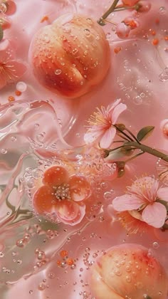 some pink flowers are floating in the water with bubbles on it's surface and one flower is surrounded by drops of water