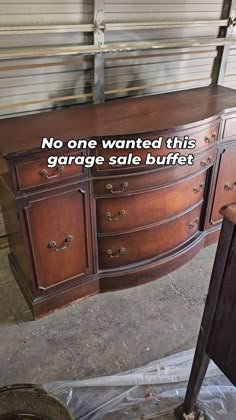 an old dresser with a sign on it that says no one wanted this garage sale buffet