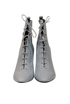 Slip into these playful Marc Jacobs boots and step up your spring fashion game. The baby blue leather and Victorian lace-up style will add a unique touch to any outfit. Pair with a floral puff sleeve dress and a chic bow for the ultimate transition look! Size 10 (IT 40) Leather upper, lining, and sole Lace up front tie Round toe Comes with a dust bag Heel height 3.5" Spring High Ankle Boots With Laces, High Ankle Boots With Laces For Spring, High Ankle Lace Boots For Spring, High Ankle Boots With Lace-up Fastening For Spring, High Ankle Boots With Front Lace-up For Spring, Spring High-top Lace-up Boots, High-top Boots With Front Lace-up For Spring, High-top Laced Boots For Spring, Spring Lace-up Boots With Lacing