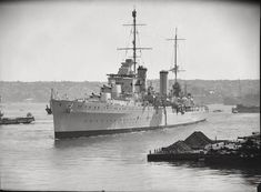 an old photo of a battleship in the water