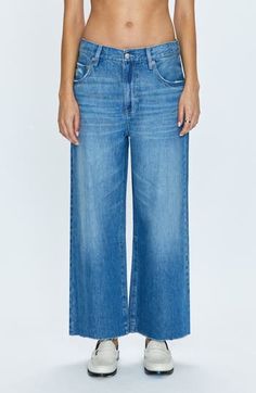 A faded wash and raw-edge hems complete these wide-leg jeans cut from nonstretch denim. 26" inseam; 25" leg opening; 11" front rise; 15" back rise (size 29) Zip fly with button closure Five-pocket style 62% cotton, 38% lyocell Machine wash, tumble dry Imported Crop Wide Leg Jeans, Summer Wardrobe Essentials, Cropped Wide Leg Jeans, Wedding Guest Shoes, Sneaker Slippers, Jean Shirt Dress, Baby Boy Shoes, Made Clothing, Sports Blazer