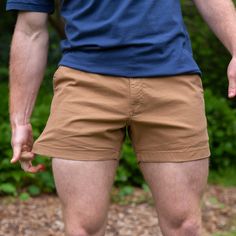 The Staples 4" Dark Khaki (Stretch Shorts) | Chubbies Stretch Cotton Pull-on Shorts, Casual Bottoms With Built-in Shorts For Warm Weather, Casual Shorts With Ribbed Waistband And Short Inseam, Fitted Solid Color Outdoor Shorts, Casual Shorts With Comfort Waistband, Casual Solid Color Pull-on Shorts, Casual Solid Color Outdoor Shorts, Casual Solid Color Shorts For Outdoor, Casual Pull-on Style Shorts