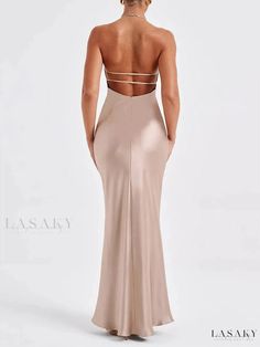 Sensual Backless Maxi Dress by Elizabeth Elegant Backless Halter Neck Dress With Built-in Bra, Beige Party Dress With Built-in Bra, Fitted Evening Maxi Dress With Strappy Back, Fitted Maxi Dress With Strappy Back For Evening, Elegant Strappy Back Maxi Dress For Evening, Elegant Backless Stretch Dress With Built-in Bra, Elegant Backless Strappy Evening Dress, Evening Backless Dress With Built-in Bra, Elegant Strappy Back Backless Dress For Gala