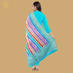 Get the celebration mood on with designer dupatta. Coming exclusively from the fine craftsmen of Banaras city is this gorgeous piece of art in the form of georgette dupatta. Having these handwoven Banarasi dupattas would add to your wardrobe. Fabric - Pure Georgette Silk Georgette is a light-weight, crinkled and sheer fabric, displaying an overall bouncy look. A strong absorbent, Georgette is easy to dye and has dull-rough texture. Georgette is made from twisting yarns of silk. Weave – Stripes C Multicolor Anarkali Traditional Silk Wear, Multicolor Anarkali Silk Traditional Wear, Multicolor Anarkali Traditional Wear With Sheer Dupatta, Multicolor Unstitched Chanderi Suit With Dupatta, Unstitched Multicolor Chanderi Suit With Dupatta, Multicolor Unstitched Katan Silk Suit In Traditional Drape, Multicolor Unstitched Silk Suit, Festive Multicolor Banarasi Silk Unstitched Suit, Unstitched Multicolor Katan Silk Suit