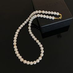 In a world saturated with mediocrity, nothing can rival the authenticity of traditional luxury. This subtly opulent necklace showcases genuine white freshwater pearls, elegantly interspersed with lab diamond studded rondelles in gold. Hand-strung with care in our Orlando studio, this gorgeous necklace is secured with a gold bonded lobster clasp. Our Men's Pearls Collection, features sophisticated fresh water pearl necklaces and bracelets, designed especially for men. Drawing inspiration from his Elegant Gold Pearl Beaded Necklaces, Classic Pearl White Necklace With Pearl Chain, Elegant Pearl White Necklace With Pearl Pendant, Elegant Akoya Pearl Beaded Necklace As Gift, Elegant Akoya Pearl Beaded Necklace For Gift, Elegant Pearl White Beaded Necklace With Pearl Pendant, Classic Pearl Bridal Necklace, Classic Bridal Pearl Necklace With Pearl Chain, Formal Pearl White Beaded Necklace With Pearl Drop