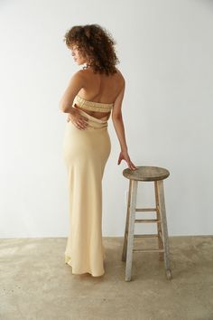 Stay RSVP ready in the Jayla Strapless Open Back Maxi Dress! This maxi dress features a strapless neckline, open back detail, and satin finish. Available in Honey; pair with some chic heels to polish off the fantasy!Details: Shell: 100% Polyester Lining: 95% Polyester, 5% Spandex Fully Lined Elastic Back Strap Silicone Grips Some Stretch Hand Wash in Cold Water/ Line Dry Perfect Wedding Guest Dress, Red Floral Top, Open Back Maxi Dress, Gameday Dress, Chic Heels, Best Dress, Strapless Neckline, The Perfect Wedding, Sweater Sale