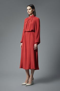 The midi dress is an elegant and versatile piece that is perfect for any occasion. With its blouson sleeves and flowing crepe de chine fabric, this dress offers both comfort and style. Its midi length makes it suitable for both formal events and casual outings, while its delicate design adds a touch of sophistication. Expertly crafted with quality material, this dress is a must-have for any fashion-forward individual. Spring Long Sleeve Crepe Dress, Orange Cream, Delicate Design, Crepe Fabric, Silk Chiffon, Cuff Sleeves, Designer Collection, Dresses Xs, Burnt Orange