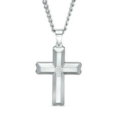 Celebrate his love of fashion with this classic diamond cross pendant. Fashioned in stainless steel, this clean-cut design features a cross-shaped arrangement of shimmering white diamonds atop a sculpted satin-finished cross. Polished bevelled edges lend further dimension to the look. Radiant with 1/20 ct. t.w. of diamonds and buffed to a brilliant luster, this pendant suspends along a 24.0-inch curb chain that secures with a lobster claw clasp. Luxury Diamond-cut Cross Necklace As Gift, White Gold Polished Cross Necklace, Sterling Silver Diamond Cut Cross Necklace, Classic Diamond Cut Cross Necklace In White Gold, White Gold Stainless Steel Cross Pendant Necklace, White Gold Stainless Steel Cross Necklace, Modern Stainless Steel Cross Jewelry, Elegant Stainless Steel Cross Necklace, Diamond Cut Cross Pendant Necklace