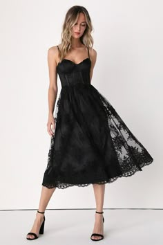 Achieve the picture-perfect romantic look with the Lulus My Darling Daydreamer Black Lace Bustier Midi Dress! A sheer mesh overlay is adorned with intricate floral embroidery (atop a satiny woven liner) as it forms adjustable straps, a sweetheart neckline, and a bustier bodice with padded, underwire cups. The set-in waist boasts strips of hidden boning before flowing into an A-line midi skirt with scalloped trim. Hidden back zipper/clasp. Fit: This garment runs small - please size up. Length: Kn Black Lace Bustier, Midi Wedding Guest Dress, Bustier Midi Dress, Black Lace Midi Dress, Guest Attire, Embroidered Midi Dress, Wedding Attire Guest, Lace Bustier, My Darling