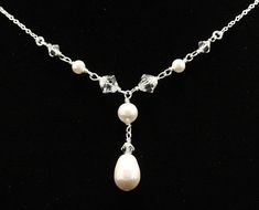 Simple pearl drop necklace $32 Elegant White Crystal Necklaces With Pearl Drop, Elegant White Crystal Necklace With Pearl Drop, Elegant Silver Crystal Necklace With Pearl Drop, Silver Crystal Necklace With Pearl Drop, Elegant Crystal Necklaces With Pearl Drop, White Pearl Crystal Necklaces For Wedding, Elegant White Dangle Crystal Necklaces, Elegant White Crystal Dangle Necklaces, Wedding White Pearl Crystal Necklaces