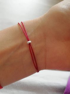 Classic Red string bracelet for women. Kabbalah red bracelet for her. Red Thread of fate. Tiny silver bracelet with red thread. Good luck bracelet. Simple Dainty silver bracelet for girl. Tiny silver beads bracelet. Lucky red string. Silver 925 beads bracelet. Protection amulet. Dainty silver bracelet for women. Crafted by high quality red thread Griffin, 1.8mm sterling silver 925 beads and 3mm sterling silver 925 bead. Universal Adjustable size with sliding knots. 100% Waterproff bracelet. Read Red Thread Of Fate, Thread Of Fate, Dainty Silver Bracelet, Silver Bracelet For Women, Personalized Best Friend Gifts, Good Luck Bracelet, Red Bracelet, Red String Bracelet, Silver Bracelets For Women