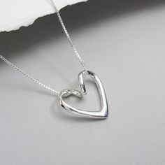 Sterling silver open heart pendant on fine sterling silver box necklace chain.  Necklace Size:  Please see sizing guide and select preference from drop down list Comes beautifully gift packaged with optional message cards Shipping Policies: Please see FAQs below Silver Heart Cut Necklace For Birthday Gift, Silver Open Heart Necklace For Birthday Gift, Silver Sterling Silver Heart Necklace For Birthday Gift, Silver Open Heart Necklace For Birthday, Silver Sterling Heart Necklace For Birthday, Double Heart Sterling Silver Necklace For Birthday Gift, Silver Heart Charm Necklace For Birthday, Dainty Silver Heart Necklace For Birthday Gift, Sterling Silver Double Heart Necklace For Birthday