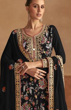 Heavy Embroidered Suit,  Salwar Straight  Suit,Indian Pakistani Salwar Kameez Dress, Salwar Suit,Heavy Georgette Pakistani dress,Eid Style Suit , Deepawali Special Suit Set in Black Color with Net and heavy Embroidery.Heavy Embroidery Palazzo Suit with Heavy Embroidery Wedding and Eid Special Plazzo Suit Set,Indian Pakistani Salwar Kameez Dress, Salwar Suit,Heavy Suit Set,Eid Style Suit , Deepawali Special Suit Set in Silk Fabric with beautiful Dupatta. Designer Latest Salwar Kameez, Salwar Suit Set Unstitched with Bandhani Dupatta and Full Embroidery on Neck Area , Customize upto 44 Size means Plus Size People Too Fabric Description : Fabric : Top - Chinnon with embroidery work Dupatta- Chinnon with Beautiful Embroidery Work Bottom - Chinnon with embroidery work Work Details : Embroidery Pakistani Dresses Eid, Black Punjabi Suit, Black Pakistani Suit, Latest Punjabi Suits, Classy Wear, Designer Salwar Kameez, Latest Salwar Kameez, Indian Designer Suits, Dress Salwar Kameez