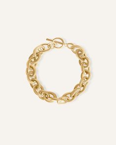 The perfect definition of bold, daring, statement and fashion-forward. The Peyton bracelet is the reinvention of chains, attracting eyes with its oval, bright gold ensemble, up-style and elevate any look for every occasion with this classy beauty. 18k Gold Plated Length: 8" chain Thickness: 10mm Hypoallergenic & non-tarnish Style Tips: The Peyton Bracelet speaks statements in itself, but it is best stacked along with our Antonette Bracelet and Fiona Bracelet to amplify that bold, daring style. F Chunky Chain Oval Link Bracelet, Bold Gold Chunky Chain Jewelry, Chic Oval Metal Jewelry, Chic Gold-tone Link Chain Bracelet, Chic Jewelry With Chunky Oval Link Chain, Chic Gold-tone Oval Link Chain Bracelet, Gold-tone Chunky Chain Bracelet, Gold-tone Chunky Chain Bracelet With Oval Links, Chic Chunky Chain Jewelry With Oval Link