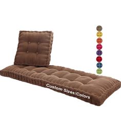 a brown futon mattress with buttons on the bottom and sides, in different colors