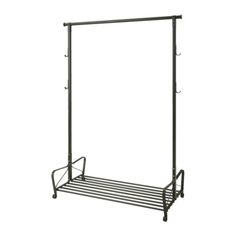 a black metal rack with two hooks on the bottom and one hanging from it's side