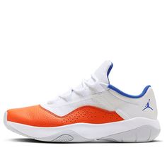 The Air Jordan 11 CMFT Low 'Knicks' is a stylish sneaker for adults, featuring a typical patent leather upper with a white base and vibrant orange wash. The muted roll-mesh fabric and clean white accents on the midsole, tongue structure and laces create a subtle yet eye-catching look. The interior tongue detailing and cushioning with mini Jumpman logo add to the sneaker's appeal. The 'Royal Blue' accents on the Cushlon sole unit provide a crisp finish. Perfect for everyday wear or sports activities, the Air Jordan 11 CMFT Low 'Knicks' is a must-have for any sneakerhead. (SNKR/AJ11/Retro/Low Top/Non-Slip/Basketball/Wear-resistant/Shock-absorbing) Orange Low-top Sneakers With Boost Midsole, White Low-top Custom Sneakers With Fade Resistance, Orange Low-top Sporty Sneakers, Sporty Orange Low-top Sneakers, Orange Sneakers With Boost Midsole For Light Sports, Orange Sporty Basketball Shoes With Rubber Sole, Orange Low-top Sneakers For Light Sports, Casual Jordan Lace-up Shoes For Sports, Casual Lace-up Jordan Shoes For Sports