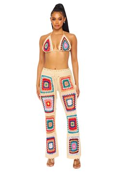 The Mali Crochet Pants Set is perfect for summer. It is crafted from high quality materials and features bright vibrant multi color crochet detailing. Perfect for vacations and summer concerts. 100% Acrylic Bohemian Crochet Bottoms For The Beach, Bohemian Crochet Bottoms For Beach, Summer Crochet Bottoms For Beach, Bohemian Crochet Beach Bottoms, Crochet Bottoms For Beach Vacation, Hippie Stretch Bottoms For Beach, Hippie Multicolor Bottoms For Beach Season, Multicolor Cotton Summer Pants, Multicolor Pants For Beach And Spring Season