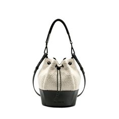 THIS STYLE IS PRE-ORDER: SHIP WINDOW JAN 1 - 30 Boucle crossbody bucket bag with structured leather base, comes with padded webbing top strap & adjustable leather crossbody strap. DetailsLightweight nylon & leather bucket bag, with adjustable shoulder to crossbody top strap. Features- Water resistant outer & lining- Drawstring Closure- Adjustable leather shoulder to cross-body strap- Interior zip pocket- key clip lanyardDimensionsW 8 " x H 10 " x D 8" Adjustable Crossbody Strap Mater Coated Canvas Bucket Bag, Coated Canvas Double Handle Bucket Bag, Bucket Shoulder Bag With Leather Handles In Coated Canvas, Coated Canvas Bucket Shoulder Bag For Daily Use, Coated Canvas Bucket Bag For Daily Use, Coated Canvas Bucket Bag For Travel, Daily Use Coated Canvas Bucket Bag, Bucket Shoulder Bag In Coated Canvas With Adjustable Strap, Coated Canvas Bucket Shoulder Bag With Detachable Handle