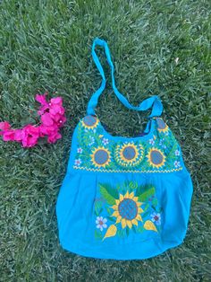 Handmade Floral Embroidered Mexican Satchel or Morral Bag Mexican Purses, Handbags & Tote Bags Hand Embroidered - Bolsa Bordada Mexicana Handmade in Chiapas, Mexico Measurements (approximate): 16 x 13 x 7 inches Strap Drop Length: 17 inches The photographs of the product were taken in natural light and they show the colors as accurately as possible. Remember that PC or cell phone screens vary and may be slightly different. If you want more information just send us a message. Blue Embroidered Bag For Daily Use, Blue Bags With Floral Embroidery For Daily Use, Daily Use Blue Bags With Floral Embroidery, Vacation Cotton Bag With Embroidery, Embroidered Cotton Vacation Bag, Embroidered Cotton Bag For Vacation, Blue Embroidered Canvas Bag For Daily Use, Blue Embroidered Bags For Everyday Use, Blue Embroidered Bag For Everyday Use