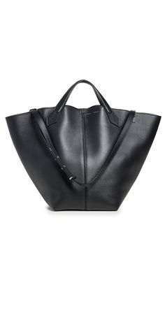 Find PROENZA SCHOULER Xl Ps1 Tote on Editorialist. Calfskin. Removable zip pouch. Top handles. Optional, adjustable strap. Leather lining. Weight: 24oz / 0.68kg. Made in Italy. Measurements: Height: 13.75in / 35cm Length: 19.25in / 49cm Depth: 11.5in / 29cm Strap drop: 19.75in / 50cm Handle drop: 3.5in / 9cm Proenza Schouler Ps1, Felt Tote, Slouchy Tote, Large Leather Tote Bag, Large Leather Tote, Bags Handmade, Leather Bags Handmade, Black Tote, Zip Pouch