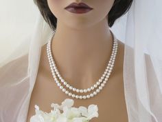 Double strand necklace Graduated pearl necklace Vintage style bridal jewelry Classic pearl necklace Elegant Double Strand Necklace For Weddings, Classic Double Strand Wedding Necklaces, Classic Double Strand Pearl Pendant Necklace, Classic Double Strand Pearl Necklace With Pendant, Classic Double Strand Pearl White Necklace, Elegant Double Strand Pearl Necklace, Double Strand Pearl Drop Necklace For Weddings, Elegant Double Strand Pearl White Pearl Necklace, White Double Strand Pearl Necklace For Wedding