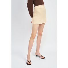 This pleated miniskirt from Emory Park in a textured solid color is perfect for any summer outfit. Made of a lightweight knit to keep you cool throughout the day. The elastic waistband allows for a comfortable and secure fit while making it simple to put on and take off. Chic Ribbed Mini Skirt, Trendy Beige Skort For Summer, Trendy Beige Mini Skirt For Summer, Solid Ribbed Skirt For Spring, Spring Mini Skort With Lined Skirt, Fitted Ribbed Skirt For Summer, Summer Pleated Mini Hem Bottoms, Beige Mini Skort For Summer, Solid Color Mini Tennis Skirt For Summer