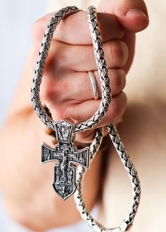 Show off your faith with this luxurious silver orthodox cross. Crafted from gleaming silver and featuring intricate detailing, this is a divinely stylish piece of jewelry that will add a touch of elegance to any outfit. Wear with pride and inspiration. Sterling silver Pendant: 64 x 38 mm Bail: 14 x 8.7 mm Please note: pendant only; chain sold separately Shown with: HEAVY SILVER BALI NECKLACE (7 MM) Handcrafted Silver Cross Processing time 1-3 business days Luxury White Gold Cross Necklace, Silver Crucifix Necklace With Polished Finish, Luxury Cross Pendant Necklace, Silver Cross Pendant Jewelry, Silver Chain Cross Jewelry, Engraved White Gold Cross Necklace, Traditional Engraved Crucifix Jewelry, Traditional Silver Cross Necklace, Luxury Silver Sterling Silver Cross Necklace