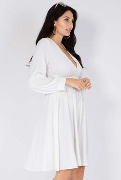 Elegant White long sleeve dress. Cozy Long Sleeve White Dress, Cozy White Long Sleeve Dress, White Long Sleeve Flowy Dress Short, White Non-stretch Long Sleeve Dress, White Long-sleeved Lined Dress, White Long Sleeve Dress, Long Sleeve Short Dress, White Long Sleeve, Long Sleeve Dress