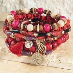 Love This Color Multi Strand With Charm And Tassel Accents Approx. L 8.25 Diameter 2 Inches Bundle For Discount Ships The Same Or Next Business Day Bohemian Beaded Jewelry For Holidays, Bohemian Beaded Holiday Jewelry, Holiday Bohemian Beaded Jewelry, Red Round Beads Jewelry For Vacation, Bohemian Red Beaded Bracelets For Vacation, Red Bohemian Bracelet For Gifts, Trendy Red Stackable Jewelry, Bohemian Red Bracelets With Colorful Beads, Trendy Red Beaded Bangle Bracelets