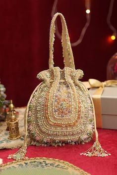 Shop for Lovetobag Amara Embellished Potli Online at Aza Fashions Traditional Bags, Bag Photoshoot, Embellished Embroidery, Purple Handbags, Potli Bag, Vintage Evening Bags, Japanese Beads, Bridal Bag, Handmade Paper Crafts