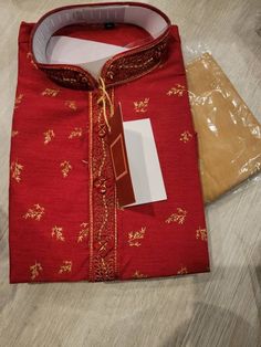 This listing is 1 full set of Kurta Pajama in specified color for Men.  Men's Kurta Pyjama with work. The sizes are available. Please measure your chest around and order accordingly. Kurta comes with pyjama made from 100% pure quality fabric with exceptionally accurate neat and durable stitching. This is Ideal for all your formal occasions. You will look natively executive anytime you put on this wear. Type :- Full Stitched Wash Care :- Dry Clean Only Wedding kurta, marriage kurta, regular kurta Unstitched Traditional Wear For Diwali Celebration, Semi-stitched Kurta For Festival Celebrations, Traditional Semi-stitched Kurta For Celebration, Traditional Unstitched Suit For Festive Celebrations, Red Dabka Kurta For Celebration, Bollywood Style Semi-stitched Sherwani For Festive Occasions, Eid Celebration Churidar With Dabka Detail, Eid Celebration Churidar With Dabka, Traditional Kurta With Pallu For Celebration