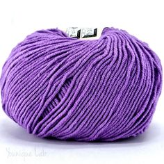 a purple ball of yarn on a white background