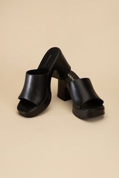 Our Cory Slide Mules boast a distinct sculptural block heel platform that adds a bold finish. The open toe, round style lend an effortless look, while the block heel ensures comfort and stability. The perfect choice for a stylish yet comfortable summer look. Trendy Mules, Heel Care, Platform Mules, Heels Online, Usa Products, Plus Swimwear, Platform Block Heels, Footwear Collection, Fabulous Shoes