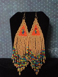 Seed Bead Earrings Long Beaded Beige Multicolored by WorkofHeart Colorful Beaded Brown Earrings For Beach, Brown Beaded Earrings For The Beach, Bohemian Beaded Chain Earrings, Traditional Multicolor Beaded Earrings With Gold Beads, Beach Beaded Earrings With Colorful Beads, Bohemian Style Long Drop Beaded Earrings, Beige Jewelry With Colorful Beads For Festivals, Beige Festival Jewelry With Colorful Beads, Beaded Beige Dangle Jewelry