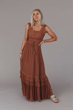 Bohemian Maxi Dress With Ruffles And Flowy Skirt, Bohemian Tiered Boho Dress For Vacation, Chic Flowy Rayon Boho Dress, Flowy Boho Print Rayon Dress, Flowy Tiered Boho Dress For Vacation, Brown Boho Maxi Dress For Spring, Brown Maxi Length Boho Dress For Spring, Spring Brown Boho Maxi Dress, Flowy Tiered Brown Dress