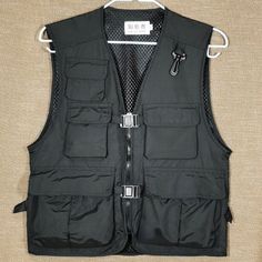 This item is for one waistcoat only. Unisex Casual Cargo Waistcoat Gilet Multi Pocket Sleeveless Jacket Vest Outdoor Please be reminded that due to lighting effects and monitor brightness/contrast setting, the color tone of the website photo and the actual item could be slightly different. This is in Asian sizing, smaller than western size e.g. UK, US, AU. Please check the measurements carefully before making a purchase. Beside, Please allow 1-3 cm difference due to manual measurement. If you ar Pocket Vest, Fishing Vest, Cargo Vest, Types Of Jackets, Hook Design, Jacket Vest, Sleeveless Jacket, Color Tone, Vest Dress