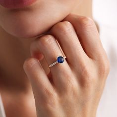 Your Sapphire Engagement Ring is stylish, dainty and pretty ideal for everyday use. Details of solid gold handmade Blue Gemstone Ring are very eye-catching. It is a great gift for your loved ones. This jewelry will be an indispensable piece of yours. This meaningful Sapphire Solitaire Ring with high quality handwork will be a legacy you can leave to your family its.  * Sapphire Diamond Ring Details * Material / Gold Kt:  14K (585), 18K (750), 8K (333) * Available Gold Colors: Yellow Gold, White Dainty Sapphire Ring For Promise, Dainty Round Halo Setting Wedding Ring, Dainty Sapphire Ring With Round Cut, Elegant Gold Ring With Lab-created Sapphire, Elegant Diamond Halo Ring With Birthstone, Blue Round Band Jewelry For Promise, Blue Round Band Promise Jewelry, Dainty Round Sapphire Ring With Diamond, Elegant Ethical Sapphire Promise Ring