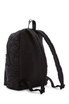 Quilted construction adds a luxe feel to this nylon backpack. Single top handle. Adjustable shoulder straps. Two-way zip top closure. Exterior features 1 zip pocket. Interior features 1 zip pocket. Perfect for school backpack or bookbag. Approx. 14" H x 14" W x 7" D. Approx. 3" handle drop, 6-12" strap drop. Imported Quilted On-the-go Standard Backpack, Everyday Nylon Backpack With Adjustable Strap, Nylon Softback Backpack For Everyday Use, School Nylon Backpack With Adjustable Strap, Nylon Softback Backpack For Daily Use, Nylon Softback Bag With Zipper Closure, School Backpack With Adjustable Straps In Nylon, School Backpack With Adjustable Nylon Straps, Nylon Backpack With Adjustable Straps