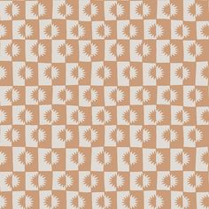 an orange and white checkered pattern with sunbursts