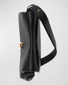 Burberry "Rocking Horse" shoulder bag in leather     Adjustable shoulder strap    Flap top with B metal clasp closure     Exterior, back slip pocket     Lining: Leather    Approx. 8.1"H x 10.2"W x 3.7"D    Made in Italy Rocking Horse, Saddle, Neiman Marcus, Top Designers, Burberry, Tops Designs, Shoulder Strap, In Italy, Horses