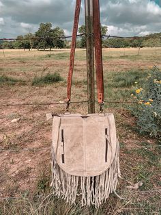 This bag is gorgeous! Zipper closure and concealed carry Measures 12x12x3 With fringe length is 23 Beige Leather Bags With Fringe, Fall Fringe Satchel Bag, Fall Fringe Shoulder Bag For Daily Use, Fall Fringe Shoulder Bag, Fringe Shoulder Bag For Fall, Fall Fringe Hobo Shoulder Bag, Fall Leather Fringe Bags, Fringe Satchel Shoulder Bag For Fall, Fall Fringe Leather Bags