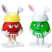 two little toys that look like they are wearing different colored outfits and ears, one is holding