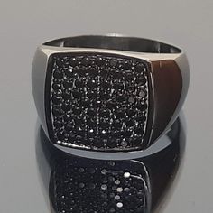 💍Amazing black diamond ring. 📜 Hand-made diamond ring in gold K9, K14 or K18. Square TV top set with black diamonds or black spine if you prefer lower cost with the same look.  A black-plated pattern all over the ring gives a sophisticated character to the ring. Choose it for you .. you're worth it. Ideal gift for your loved person also. ✍ Designed and created by Babuco Athens. ♻A recycled piece. ⚖ Ring's weight: In K9 7,5grm, in K14 8,5grm and in K18 9,5grm approxemently. 📐Top Dimensions: 15X15mm. 💎Gems certificate available. 🎁Gift box included. 😊Thank you for stopping by. Modern Black Diamond Ring Gift, Modern Diamond Ring With Black Diamonds For Gift, Modern Diamond Ring With Black Diamonds As A Gift, Modern Diamond Ring With Black Diamonds, Black Stainless Steel Signet Promise Ring, Black Rectangular Anniversary Ring, Black Diamond Ring With Black Spinel, Modern Black Diamond Anniversary Ring, Black Cubic Zirconia Ring With Vvs Clarity